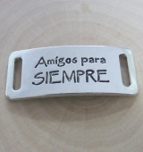 Conector metlico Amigos para siempre color plata vieja. 40x16mm. Agujero 10x2mm.