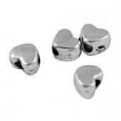 (10Grs - 95unid. aprox) Abalorios metlicos corazones aleacin de metal color plata vieja  3,5mm. Agujero 1mm.